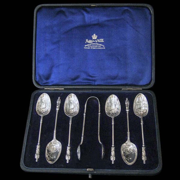 Cased set of Victorian Silver Decorative Teaspoons with Sugar Tongs