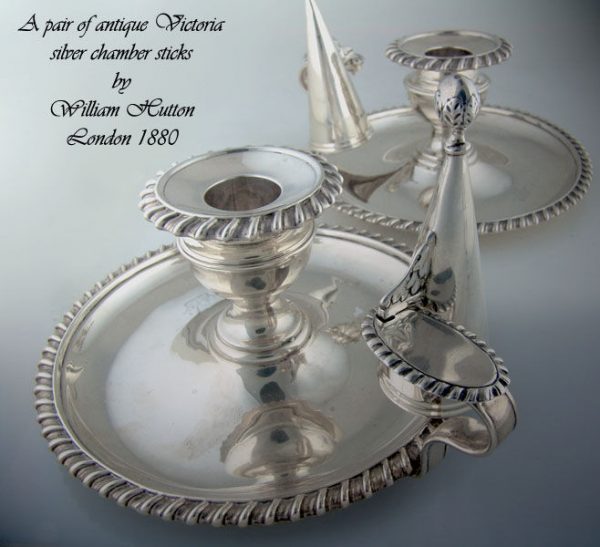 A pair of antique Victorian silver chamber sticks