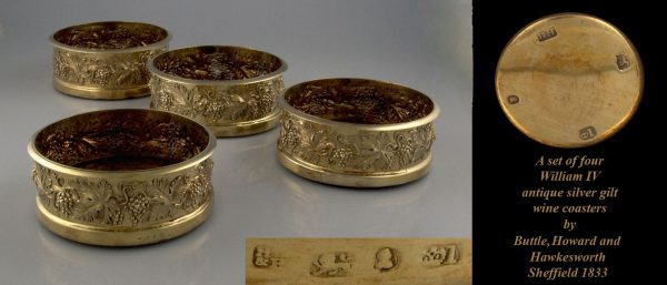 A set of four William IV silver gilt wine coasters